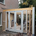 zijaanbouw in aanbouw  Bergen